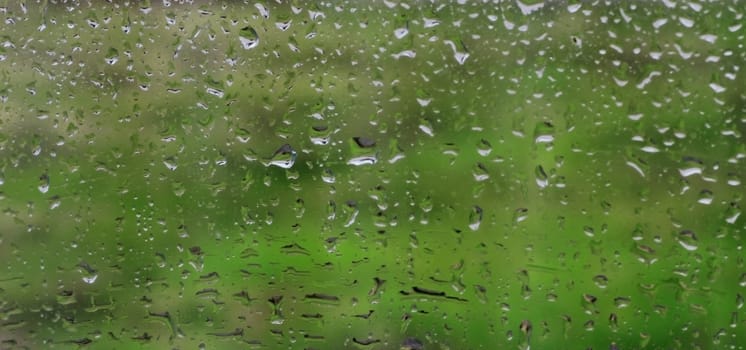 Water drops on window glass after rain