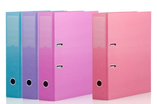 Four different color binders on white background.