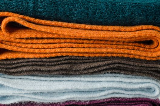 Pile of colorful scarves, can work as a background.