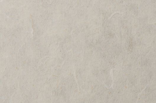 Recycled paper texture closeup background.