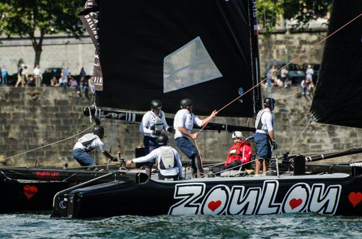 PORTO, PORTUGAL - JULY 07: ZouLou compete in the Extreme Sailing Series boat race on july 07, 2012 in Porto, Portugal.