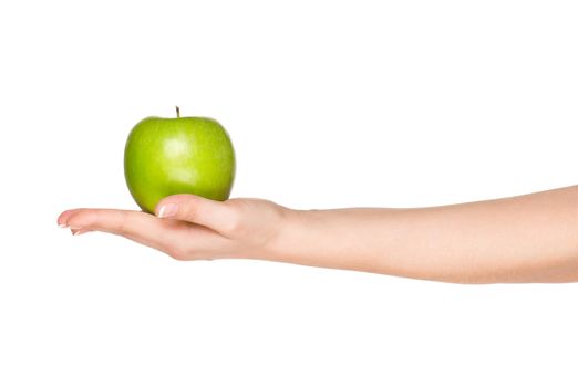 Woman hand with green apple isolated on white background