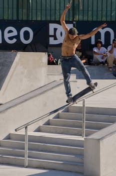 VISEU, PORTUGAL - JULY 22: Pedro Roseiro on the rail at DC Skate challenge by MEO on july 22, 2012 in Viseu, Portugal.