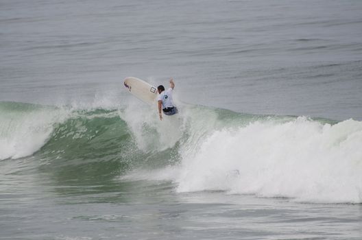 OVAR, PORTUGAL - AUGUST 19: Unidentified surfer at 1st stage of National Longboard Championship  on august 19, 2012 in Ovar, Portugal.