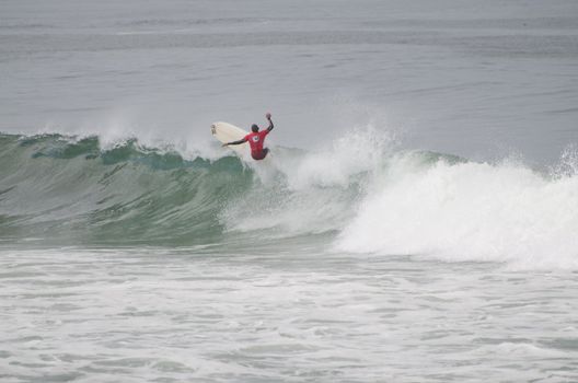 OVAR, PORTUGAL - AUGUST 19: Unidentified surfer at 1st stage of National Longboard Championship  on august 19, 2012 in Ovar, Portugal.