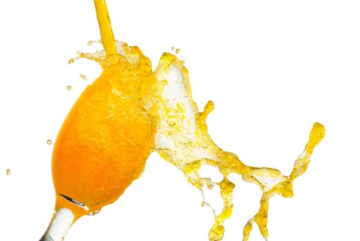 glass of orange juice, splash and jet