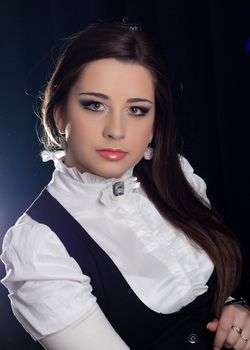 beautifull brunette , shooting in the studio with dark background 