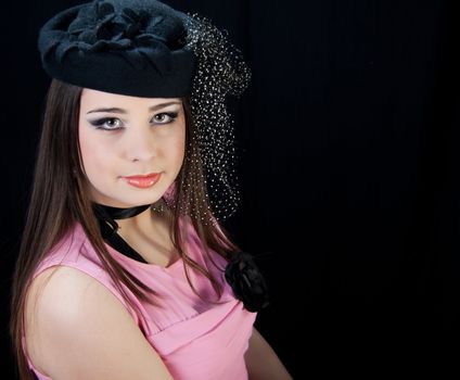 beautifull brunette , shooting in the studio with dark background 