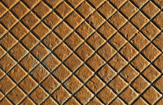 Rusty metal surface square grid