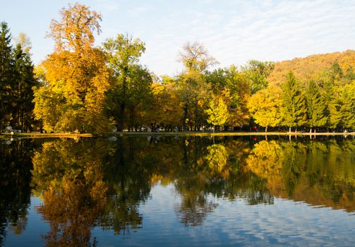 Beautiful colors of autumn landscape by the lake