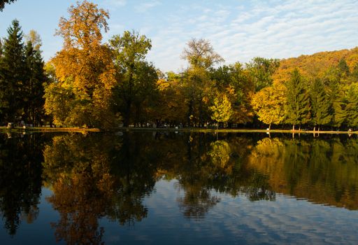 Beautiful colors of autumn landscape by the lake