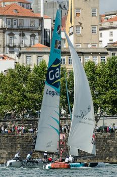 PORTO, PORTUGAL - JULY 07: GAC Pindar compete in the Extreme Sailing Series boat race on july 07, 2012 in Porto, Portugal.