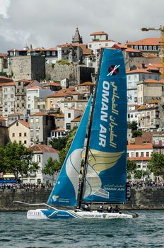PORTO, PORTUGAL - JULY 07: Oman Air compete in the Extreme Sailing Series boat race on july 07, 2012 in Porto, Portugal.