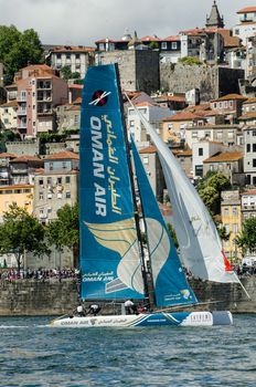 PORTO, PORTUGAL - JULY 07: Oman Air compete in the Extreme Sailing Series boat race on july 07, 2012 in Porto, Portugal.