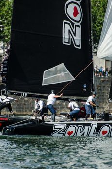 PORTO, PORTUGAL - JULY 07: ZouLou compete in the Extreme Sailing Series boat race on july 07, 2012 in Porto, Portugal.