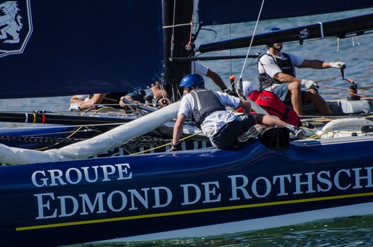 PORTO, PORTUGAL - JULY 07: Groupe Edmond de Rothschild compete in the Extreme Sailing Series boat race on july 07, 2012 in Porto, Portugal.