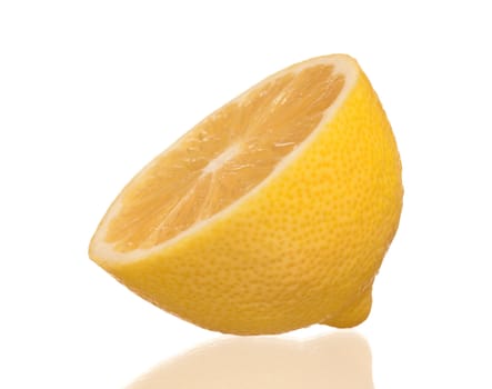 Fresh half lemon isolated on white background