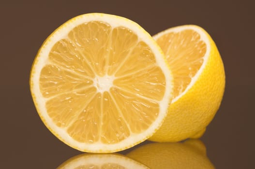 Slice of fresh lemons isolated on grey background