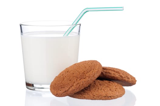 Glass of milk with cookies isolated on white background