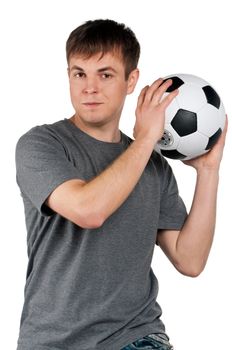 Portrait of a man standing with classic soccer ball on isolated white background