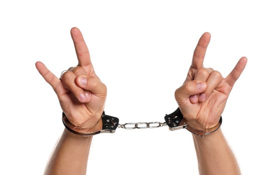 Man hands with handcuffs isolated on white background