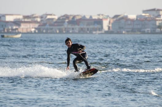 ILHAVO, PORTUGAL - JULY 21: Unidentified rider  during the wakeboard demo in the 3rd Kiteloop Contest Aveiro 2012 on july 21, 2012 in Ilhavo, Portugal.