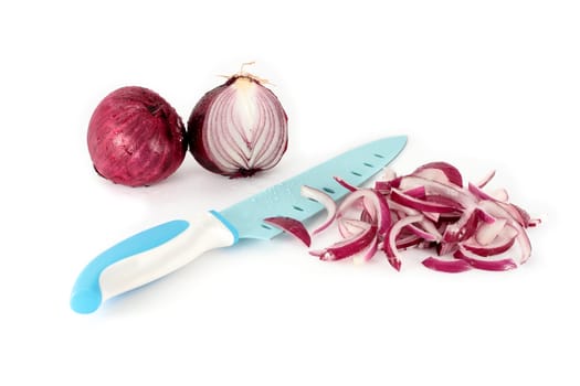 chopped onion with a kitchen knife on a white background
