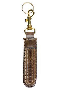 Leather key chain isolated on white background.