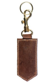 Leather key chain isolated on white background.
