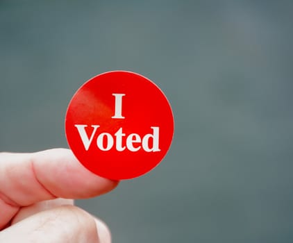 Voter Proudly Displays Evidence that He Voted on Election Day in the United States.