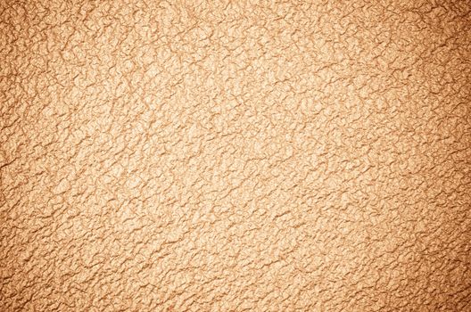 Closeup detail of golden abstract texture background.