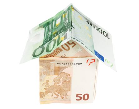investment concept with a house made of European banknotes