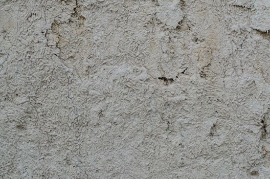 Closeup detail of white stucco wall.