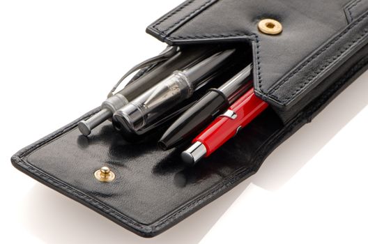 Leather pencil case isolated on white background.