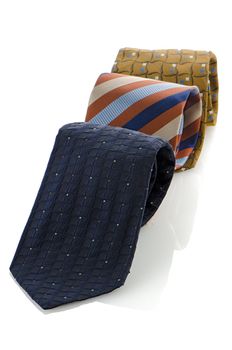 Closeup of three ties isolated on white background.