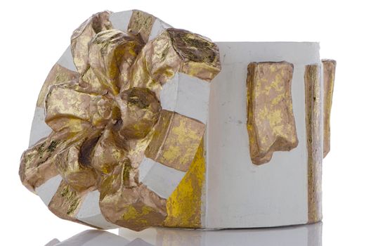 Open Christmas decorative white gift box with golden ribbon.