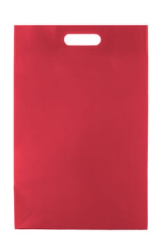 Red  paper bag over white background.