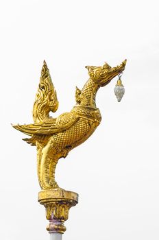 Golden statue of creature