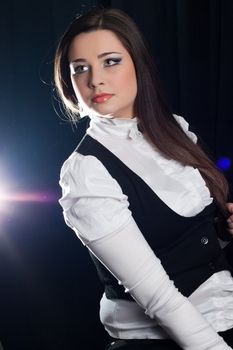 beautifull brunette , shooting in the studio with dark background 