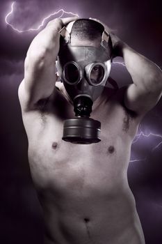 Storm, toxic energy, man with protective gas mask