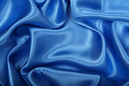 Smooth elegant blue silk can use as background 