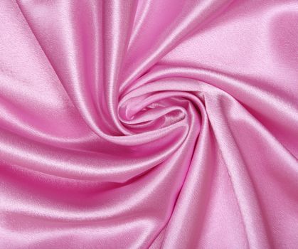 Smooth elegant pink silk as background 