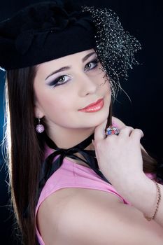 beautifull brunette , shooting in the studio with dark background 