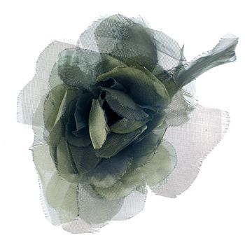 Green fabric flower isolated on a white background.