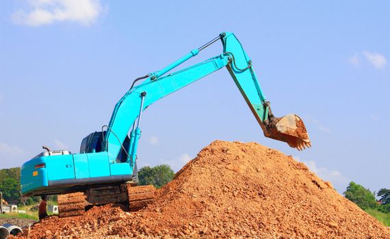 Excavator loader machine during works outdoor  at construction site 