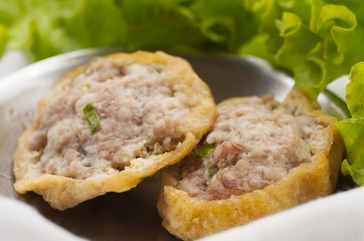 Steam pork and tofu dim sum in small plate