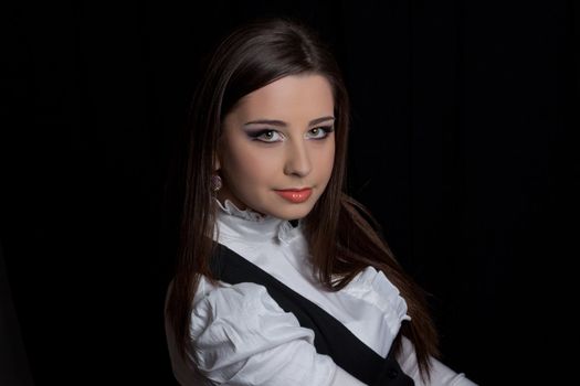 beautifull brunette , shooting in the studio with dark background 