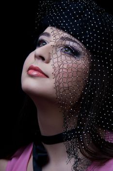 beautifull brunette , shooting in the studio with dark background 