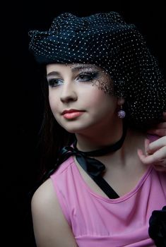 beautifull brunette , shooting in the studio with dark background 