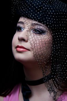 beautifull brunette , shooting in the studio with dark background 